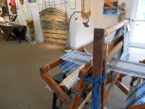 weaving loom at fiber arts show